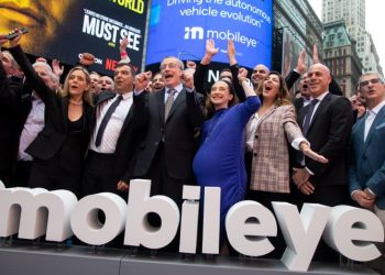 Amnon Shashua, president and chief executive officer of Mobileye Global Inc., and Patrick Gelsinger, chief executive officer of Intel Corp., outside the Nasdaq MarketSite during the company’s IPO in New York, US, on Wednesday, Oct. 26, 2022. Michael Nagle | Bloomberg | Getty Images